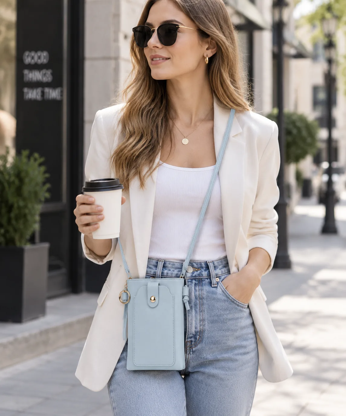 Sky Blue Phone Crossbody Bag — Worn scale